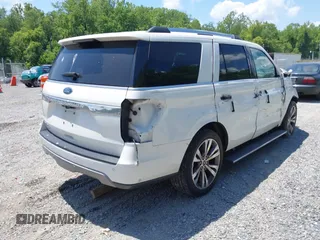 2020 Ford Expedition Limited with VIN 1FMJU1KTXLEA74860, listed as a IAAI auction lot 42557757 with 107,538 mi miles and . Bid and sale history available at DreamBid. Image 4.