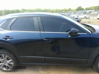 2022 Mazda CX-30 S Carbon Edition with VIN 3MVDMBCL6NM423255, listed as a IAAI auction lot 42209829 with 51,589 mi miles and . Bid and sale history available at DreamBid. Image 13.