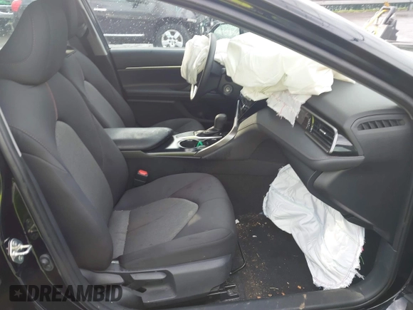 2019 Toyota Camry LE with VIN 4T1B11HK2KU263910, listed as a IAAI auction lot 42060008 with 31,433 mi miles and . Bid and sale history available at DreamBid. Image 5.