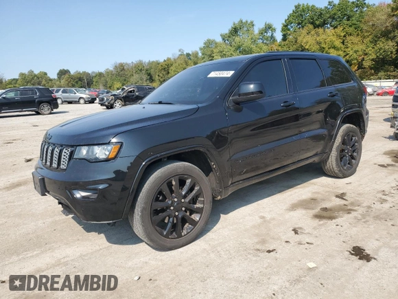 2018 Jeep Grand Cherokee Laredo E with VIN 1C4RJFAG9JC390597, listed as a Copart auction lot 71450474 with 69,645 mi miles and Salvage title. Bid and sale history available at DreamBid. Image 1.