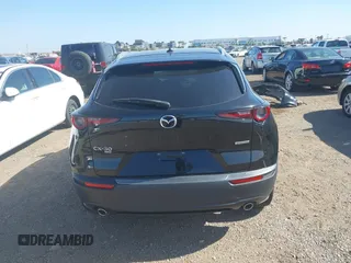 2022 Mazda CX-30 S Premium with VIN 3MVDMBDL6NM407913, listed as a IAAI auction lot 42359860 with 35,804 mi miles and . Bid and sale history available at DreamBid. Image 17.