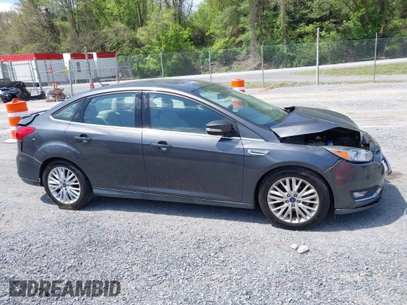 2018 Ford Focus Titanium с VIN 1FADP3J22JL314642, выставлен на аукционе IAAI как лот 42128194 с пробегом 62 787 миль миль и . История ставок и продаж доступна на DreamBid. Изображение 13.
