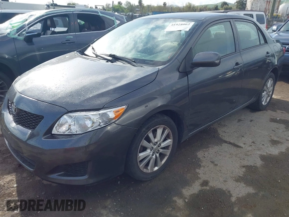 2009 Toyota Corolla with VIN 1NXBU40E79Z042778, listed as a IAAI auction lot 41928062 with 201,409 mi miles. Bid and sale history available at carsss.com. Image 2.