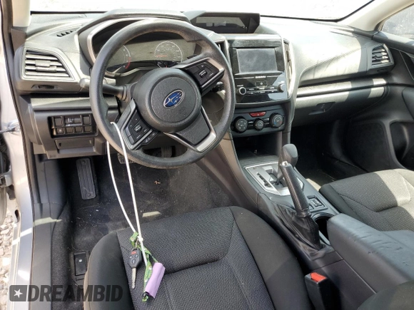 2018 Subaru Impreza Premium с VIN 4S3GTAB66J3721503, выставлен на аукционе Copart как лот 61879115 с пробегом Не указан миль и Списание • Salvage title. История ставок и продаж доступна на DreamBid. Изображение 8.