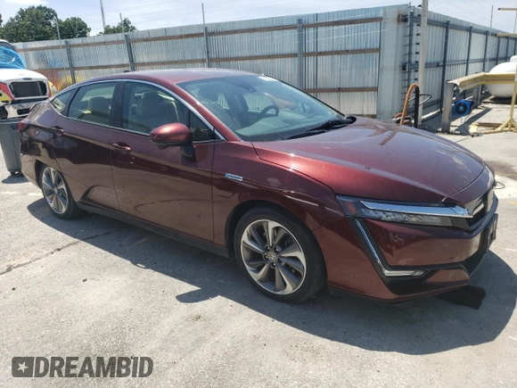 2018 Honda Clarity Touring with VIN JHMZC5F34JC006234, listed as a Copart auction lot 65652714 with 63,704 mi miles and Salvage Title. Bid and sale history available at DreamBid. Image 4.