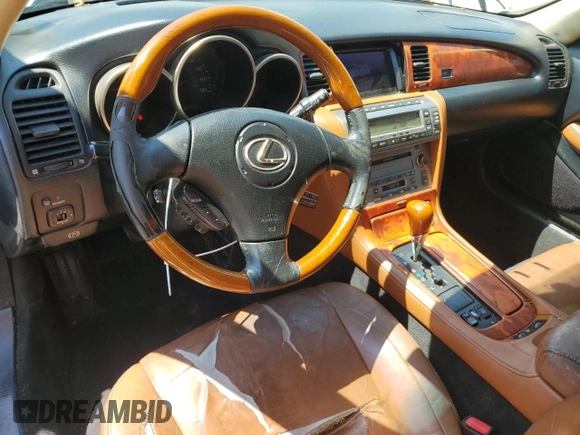 2004 Lexus SC 430 with VIN JTHFN48Y040052035, listed as a Copart auction lot 63689275 with 147,355 mi miles and Salvage title. Bid and sale history available at DreamBid. Image 8.