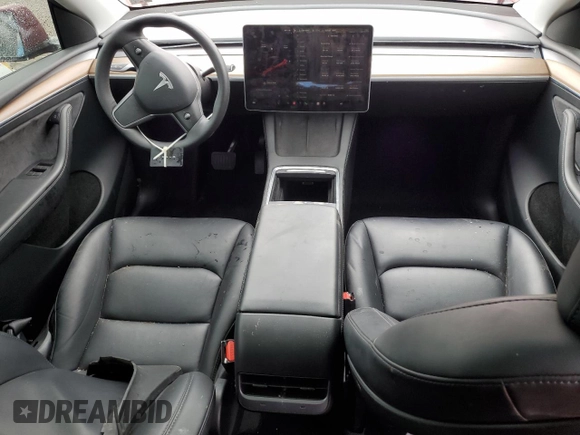 2023 Tesla Model Y Long Range z VIN 7SAYGAEE1PF690008, wystawiony jako Copart lot #54441735 z przebiegiem 38 291 mil mil oraz Szkody całkowita. Historia ofert i sprzedaży dostępna na DreamBid. Obrazek 8.