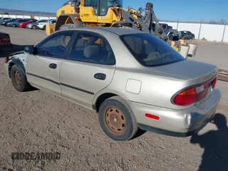 1997 Mazda Protege DX with VIN JM1BC1412V0155780, listed as a IAAI auction lot 42134286 with Not Provided miles and . Bid and sale history available at DreamBid. Image 3.
