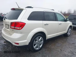 2017 Dodge Journey SXT z VIN 3C4PDDBG0HT556196, wystawiony jako IAAI lot #42005647 z przebiegiem 78 254 mil mil oraz . Historia ofert i sprzedaży dostępna na DreamBid. Obrazek 4.