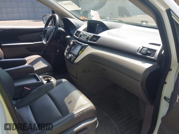 2015 Honda Odyssey EX-L with VIN 5FNRL5H64FB069742, listed as a IAAI auction lot 42101807 with 152,611 mi miles and . Bid and sale history available at DreamBid. Image 5.