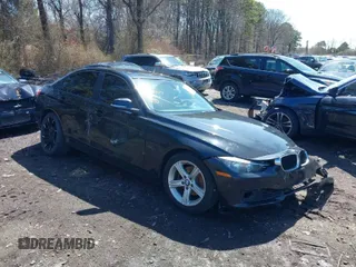 2014 BMW 3 Series 328i xDrive with VIN WBA3B5G59ENS09377, listed as a IAAI auction lot 41921377 with 102,160 mi miles. Bid and sale history available at carsss.com. Image 1.