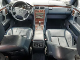 1996 Mercedes-Benz E-Class with VIN WDBJF55F5TJ022277, listed as a Copart auction lot 52597985 with 213,848 mi miles and Clean Title. Bid and sale history available at carsss.com. Image 8.