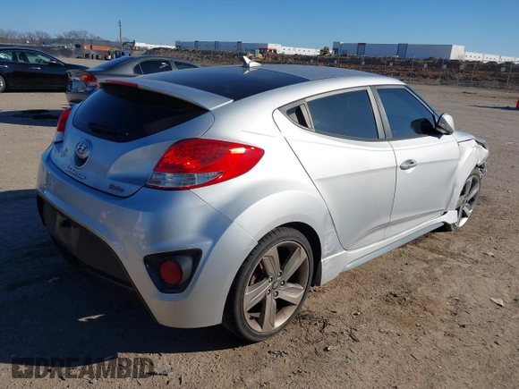 2013 Hyundai Veloster Turbo with VIN KMHTC6AE6DU162372, listed as a IAAI auction lot 41481820 with 105,650 mi miles and . Bid and sale history available at DreamBid. Image 4.