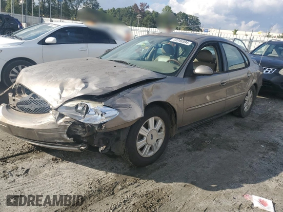 2003 Ford Taurus SEL Deluxe with VIN 1FAHP56SX3A243775, listed as a Copart auction lot 72245394 with 251,041 mi miles and Salvage Title. Bid and sale history available at DreamBid. Image 1.