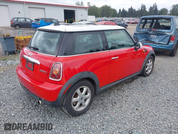 2010 MINI Hardtop with VIN WMWMF3C51ATZ65259, listed as a IAAI auction lot 42248896 with 106,216 mi miles and . Bid and sale history available at DreamBid. Image 4.