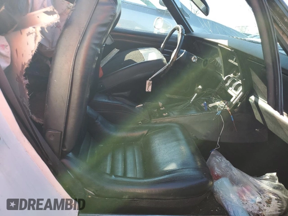 1979 Chevrolet Corvette with VIN 1Z8789S406567, listed as a Copart auction lot 43365335 with 90,615 mi miles and Salvage title. Bid and sale history available at DreamBid. Image 7.