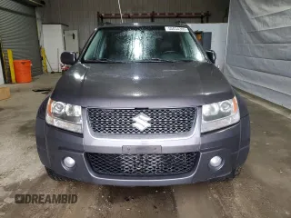 2012 Suzuki Grand Vitara Limited z VIN JS3TD0D76C4100949, wystawiony jako Copart lot #55834305 z przebiegiem 241 042 mil mil oraz Tytuł czysty. Historia ofert i sprzedaży dostępna na DreamBid. Obrazek 5.
