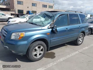 2008 Honda Pilot EX-L with VIN 5FNYF18798B025615, listed as a IAAI auction lot 38909579 with 121,128 mi miles. Bid and sale history available at carsss.com. Image 2.