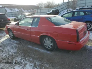 2002 Cadillac Eldorado z VIN 1G6EC12972B106132, wystawiony jako Copart lot #86799624 z przebiegiem 75 334 mil mil oraz Szkoda całkowita • Salvage title. Historia ofert i sprzedaży dostępna na DreamBid. Obrazek 2.