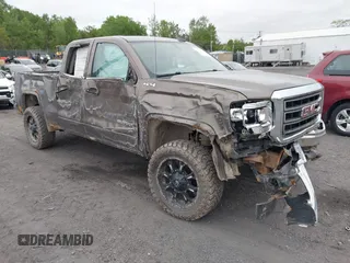 2015 GMC Sierra 1500 SLE z VIN 1GTV2UEC8FZ188880, wystawiony jako IAAI lot #42302490 z przebiegiem 123 045 mil mil oraz . Historia ofert i sprzedaży dostępna na DreamBid. Obrazek 1.