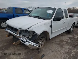 2003 Ford F-150 XL with VIN 1FTRX17W43NA31343, listed as a IAAI auction lot 41576625 with 1 mi miles. Bid and sale history available at carsss.com. Image 2.