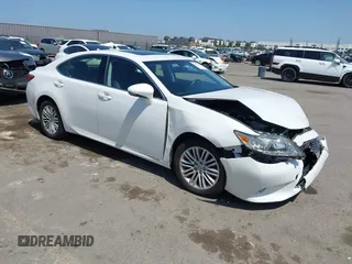 2014 Lexus ES 330 z VIN JTHBK1GG6E2113795, wystawiony jako IAAI lot #42207580 z przebiegiem 128 540 mil mil oraz . Historia ofert i sprzedaży dostępna na DreamBid. Obrazek 1.