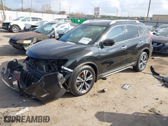 2017 Nissan Rogue SV with VIN 5N1AT2MT7HC748830, listed as a IAAI auction lot 41517488 with 92,270 mi miles and . Bid and sale history available at DreamBid. Image 18.
