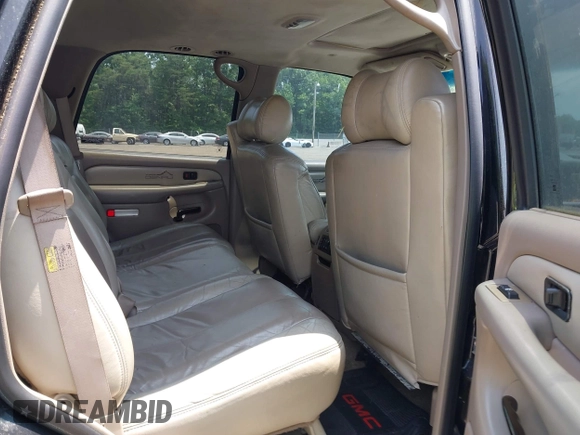 2002 GMC Yukon Denali z VIN 1GKEK63U82J189550, wystawiony jako IAAI lot #42416885 z przebiegiem 209 115 mil mil oraz . Historia ofert i sprzedaży dostępna na DreamBid. Obrazek 8.