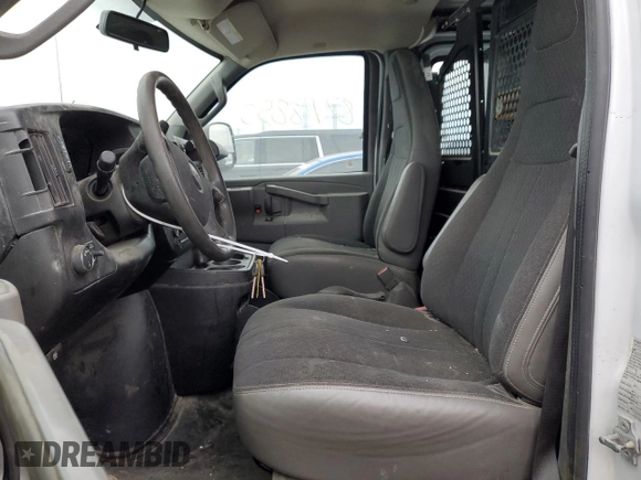 2019 GMC Savana Cargo z VIN 1GTW7AFG8K1272311, wystawiony jako Copart lot #87918855 z przebiegiem 141 396 mil mil oraz Szkody całkowita. Historia ofert i sprzedaży dostępna na DreamBid. Obrazek 7.