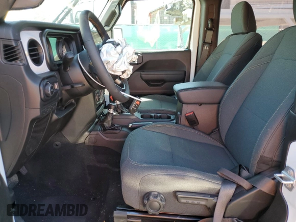 2024 Jeep Wrangler Sport S with VIN 1C4PJXAG1RW349260, listed as a Copart auction lot 60270065 with 5,575 mi miles and Salvage title. Bid and sale history available at DreamBid. Image 7.