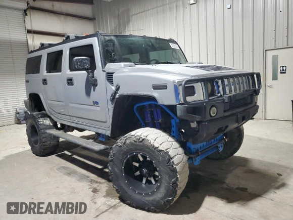2003 Hummer H2 with VIN 5GRGN23UX3H121083, listed as a Copart auction lot 42355145 with 249,973 mi miles and Clean Title. Bid and sale history available at carsss.com. Image 4.