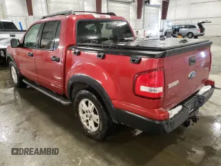 2007 Ford Explorer Sport Trac XLT with VIN 1FMEU518X7UA04941, listed as a Copart auction lot 83841834 with 153,039 mi miles and Salvage title. Bid and sale history available at DreamBid. Image 2.