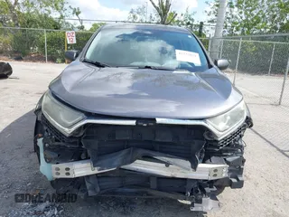 2018 Honda CR-V LX z VIN 2HKRW6H34JH233181, wystawiony jako IAAI lot #42233671 z przebiegiem 116 071 mil mil oraz . Historia ofert i sprzedaży dostępna na DreamBid. Obrazek 13.