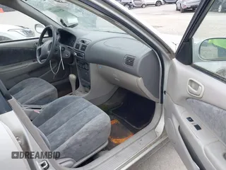 1999 Toyota Corolla VE z VIN 2T1BR12E7XC154444, wystawiony jako IAAI lot #42514069 z przebiegiem 209 377 mil mil oraz . Historia ofert i sprzedaży dostępna na DreamBid. Obrazek 5.