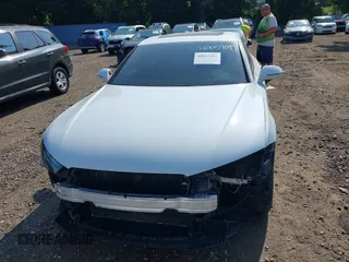 2016 Audi A7 3.0 Premium Plus with VIN WAUWGAFC4GN017486, listed as a IAAI auction lot 40057097 with 85,937 mi miles. Bid and sale history available at carsss.com. Image 12.
