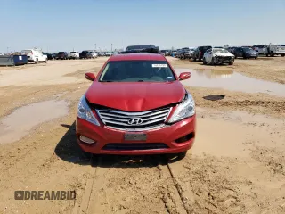 2013 Hyundai Azera z VIN KMHFG4JG5DA224594, wystawiony jako Copart lot #59870195 z przebiegiem 124 316 mil mil oraz Szkoda całkowita • Salvage title. Historia ofert i sprzedaży dostępna na DreamBid. Obrazek 5.