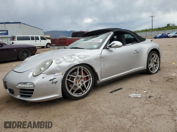2009 Porsche 911 Carrera S with VIN WP0CB29919S755552, listed as a Copart auction lot 59403325 with 57,990 mi miles and Salvage title. Bid and sale history available at DreamBid. Image 1.