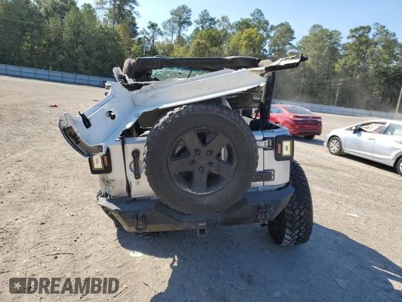 2012 Jeep Wrangler Sport с VIN 1C4AJWAG3CL232403, выставлен на аукционе Copart как лот 48869505 с пробегом Не указан миль и Списание • Salvage title. История ставок и продаж доступна на DreamBid. Изображение 6.