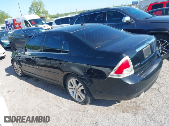 2007 Ford Fusion SEL with VIN 3FAHP02147R230273, listed as a IAAI auction lot 42020726 with 265,569 mi miles. Bid and sale history available at carsss.com. Image 3.