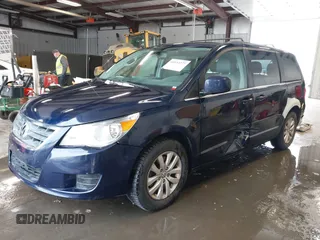 2014 Volkswagen Routan SE with VIN 2C4RVABG2ER134482, listed as a IAAI auction lot 41533277 with 118,193 mi miles and . Bid and sale history available at DreamBid. Image 2.