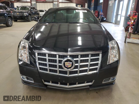 2013 Cadillac CTS Premium with VIN 1G6DP1E3XD0103876, listed as a Copart auction lot 53304795 with 94,963 mi miles and Salvage Title. Bid and sale history available at DreamBid. Image 5.