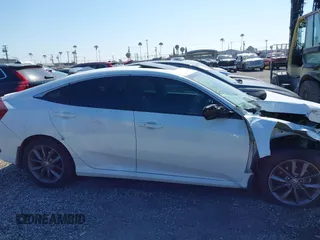 2020 Honda Civic EX-L with VIN 19XFC1F70LE203137, listed as a IAAI auction lot 42028424 with 87,011 mi miles and . Bid and sale history available at DreamBid. Image 14.