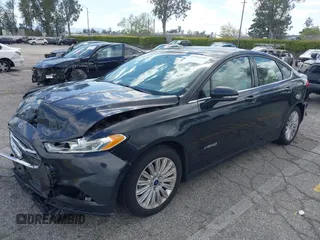 2015 Ford Fusion SE Hybrid with VIN 3FA6P0LU7FR199065, listed as a IAAI auction lot 41944181 with 197,020 mi miles. Bid and sale history available at carsss.com. Image 18.