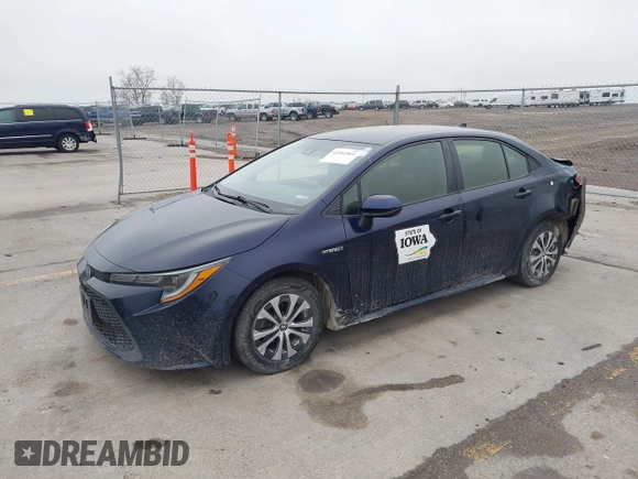 2021 Toyota Corolla Hybrid LE with VIN JTDEAMDE9MJ003172, listed as a IAAI auction lot 42062851 with 96,753 mi miles. Bid and sale history available at carsss.com. Image 2.