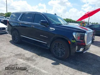 2021 GMC Yukon Denali with VIN 1GKS2DKL7MR471280, listed as a IAAI auction lot 40189766 with 126,591 mi miles. Bid and sale history available at carsss.com. Image 1.