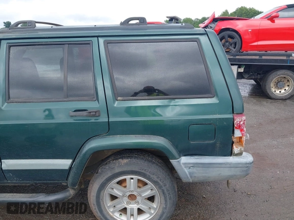 2000 Jeep Cherokee with VIN 1J4FT48S4YL240347, listed as a IAAI auction lot 42361311 with Not provided miles and . Bid and sale history available at DreamBid. Image 14.