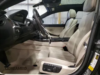 2015 BMW 6 Series 640i xDrive z VIN WBA6B8C58FD453159, wystawiony jako Copart lot #88931285 z przebiegiem 145 656 mil mil oraz Szkoda całkowita • Salvage title. Historia ofert i sprzedaży dostępna na DreamBid. Obrazek 7.