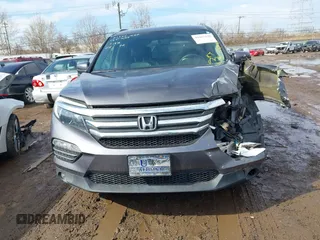 2017 Honda Pilot EX-L with VIN 5FNYF5H53HB029780, listed as a IAAI auction lot 41667838 with 104,803 mi miles. Bid and sale history available at carsss.com. Image 12.