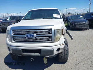 2011 Ford F-150 XLT with VIN 1FTFW1ET7BFB16524, listed as a IAAI auction lot 41729414 with 134,924 mi miles. Bid and sale history available at carsss.com. Image 13.