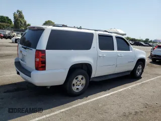 2014 Chevrolet Suburban LT with VIN 1GNSKJE79ER112840, listed as a Copart auction lot 64709074 with Not Provided miles and Salvage Title. Bid and sale history available at DreamBid. Image 3.